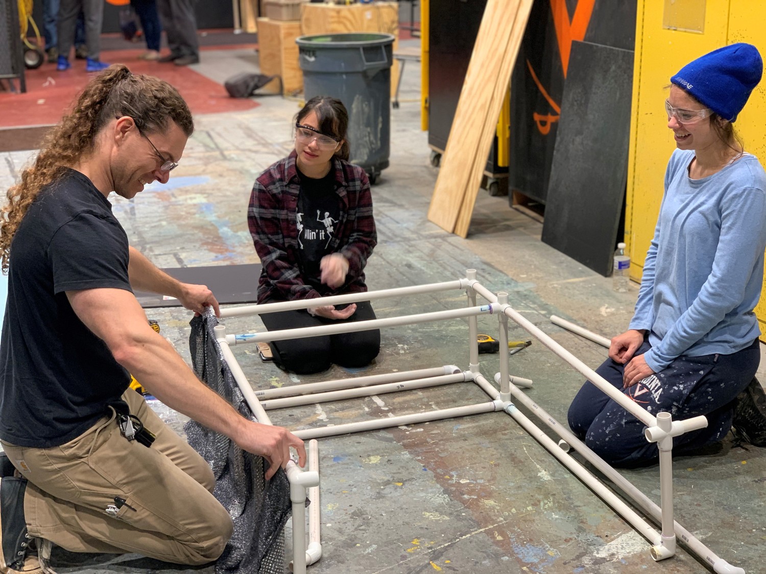 (L to R) Brian Gibney (Bennett’s Village) and undergraduate student Megumi (Meg) Ritchie helping Jessica Burnam with frame work for Rock Star Princess.