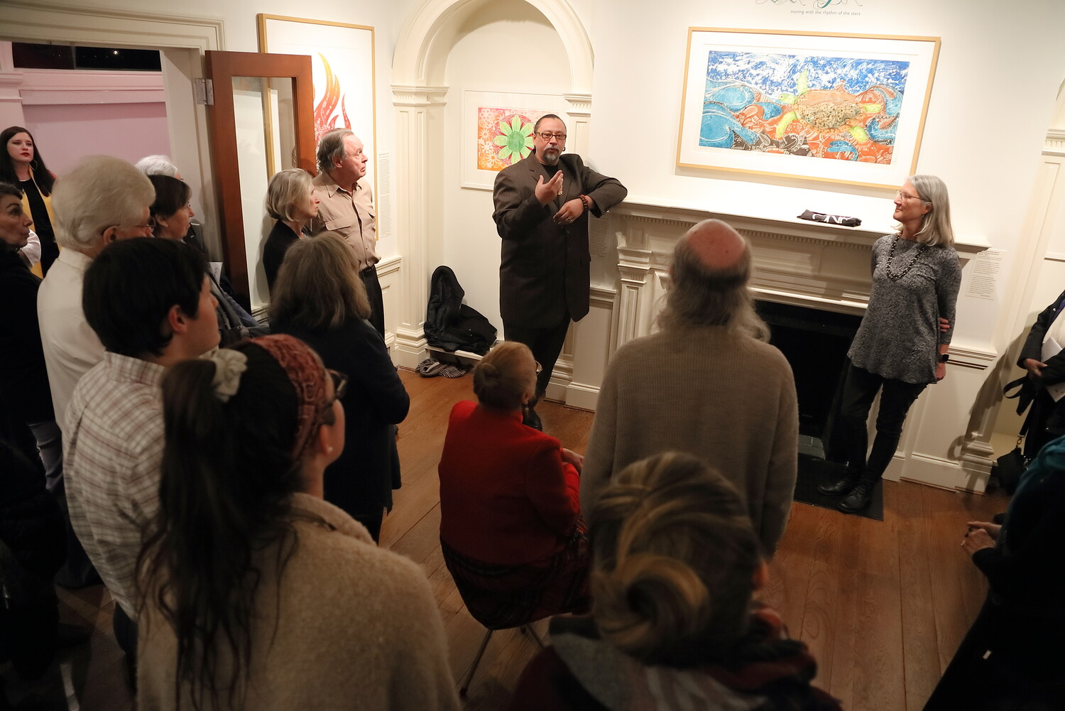 Torres Strait Islander artist Brian Robinson discussing his work at the opening reception of the exhibition Tithuyil: Moving with the Rhythm of the Stars at Kluge-Ruhe in February. Photo by Tom Cogill